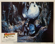 Load image into Gallery viewer, An original 11x14 lobby card for the film Raiders of the Lost Ark
