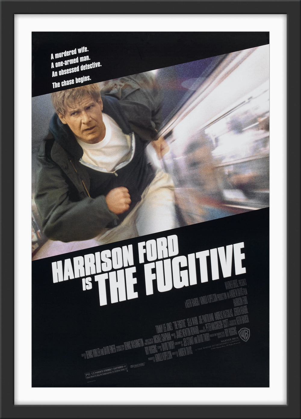 An original movie poster for the Harrison Ford film The Fugitive