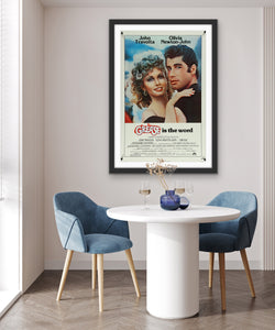 An original movie poster for the film Grease