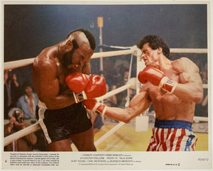 An original lobby card for the film Rocky III