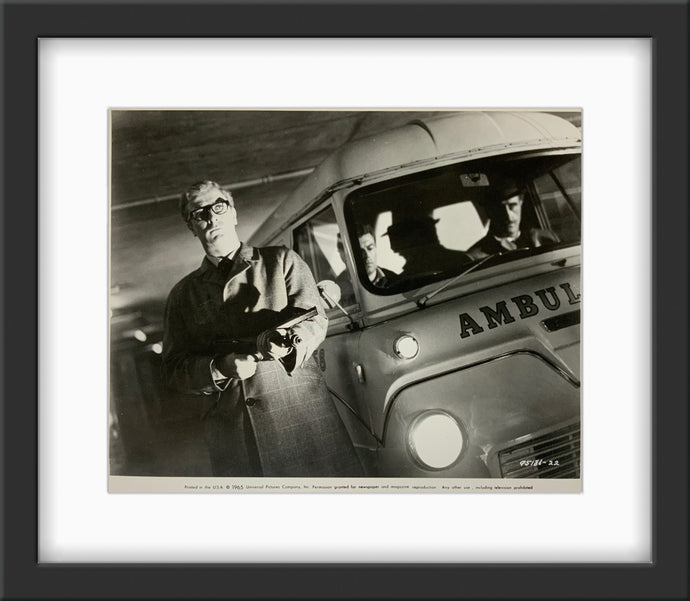 An original 8x10 movie still from the Michael Caine film The Ipcress Files
