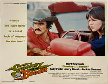 Load image into Gallery viewer, An original 11x14 lobby card for the Burt Reynolds film Smokey and the Bandit