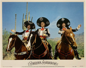 An original 11x14 lobby card for the comedy film Three Amigos