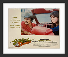 Load image into Gallery viewer, An original 11x14 lobby card for the Burt Reynolds film Smokey and the Bandit