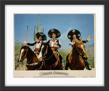 Load image into Gallery viewer, An original 11x14 lobby card for the comedy film Three Amigos
