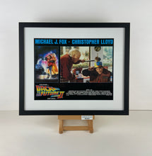 Load image into Gallery viewer, An original 11x14 lobby card for the film Back to the Future 2 / II