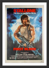 Load image into Gallery viewer, An original movie poster for the Sylvester Stallone film First Blood with artwork by Drew Struzan