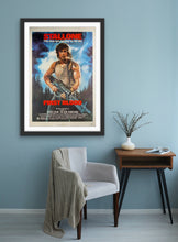 Load image into Gallery viewer, An original movie poster for the Sylvester Stallone film First Blood with artwork by Drew Struzan