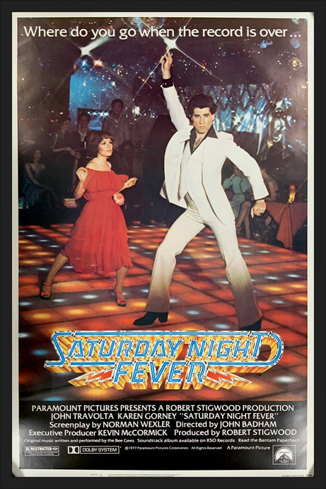 An original movie poster for the film Saturday Night Fever