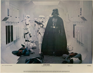 An original and framed 11x14 lobby card for the film Star Wars / Episode 4 / IV / A New Hope