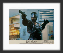 Load image into Gallery viewer, An original lobby card for the film Robocop