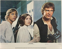 Load image into Gallery viewer, An original 11x14 lobby card for the George Lucas film Star Wars