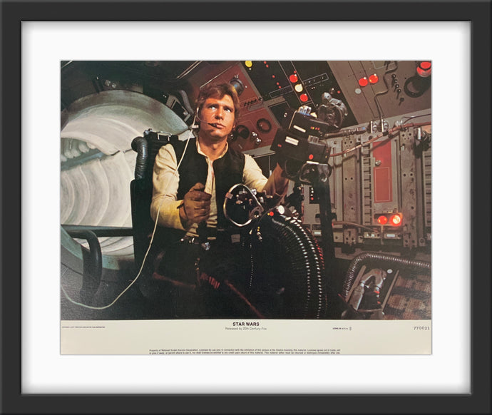 An original 11x14 lobby card for the George Lucas film Star Wars