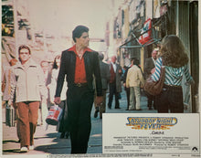Load image into Gallery viewer, An original 11x14 lobby card for the film Saturday Night Fever