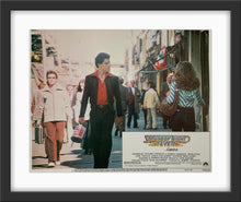 Load image into Gallery viewer, An original lobby card for the John Travolta movie Saturday Night Fever