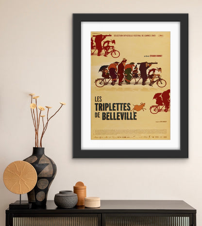 An original french movie poser for the film The Triplets of Belleville