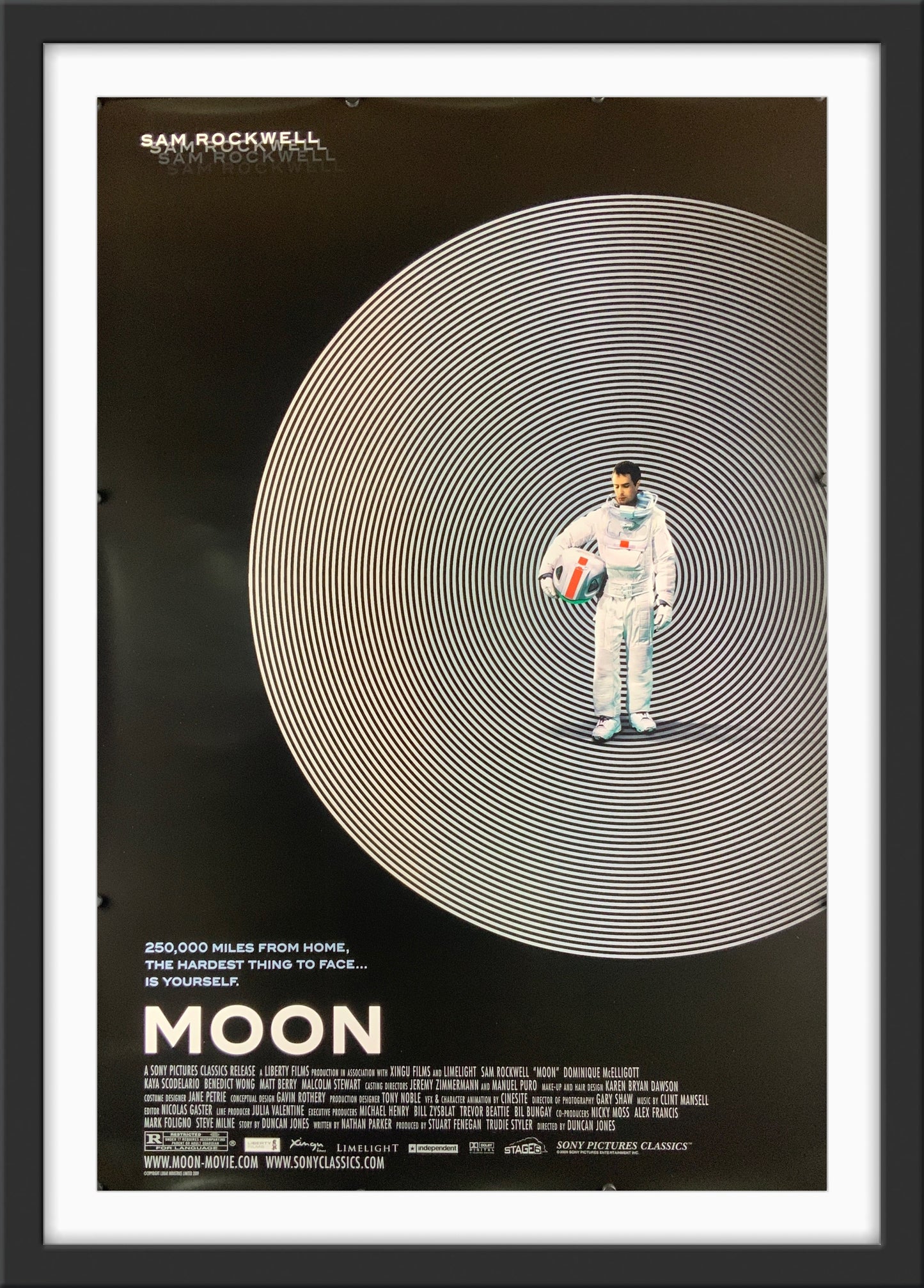 An original movie poster for the Duncan Jones film Moon