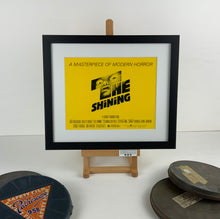 Load image into Gallery viewer, An original 8x10 title lobby card with art by Saul Bass for the Stanley Kubrick film The Shining