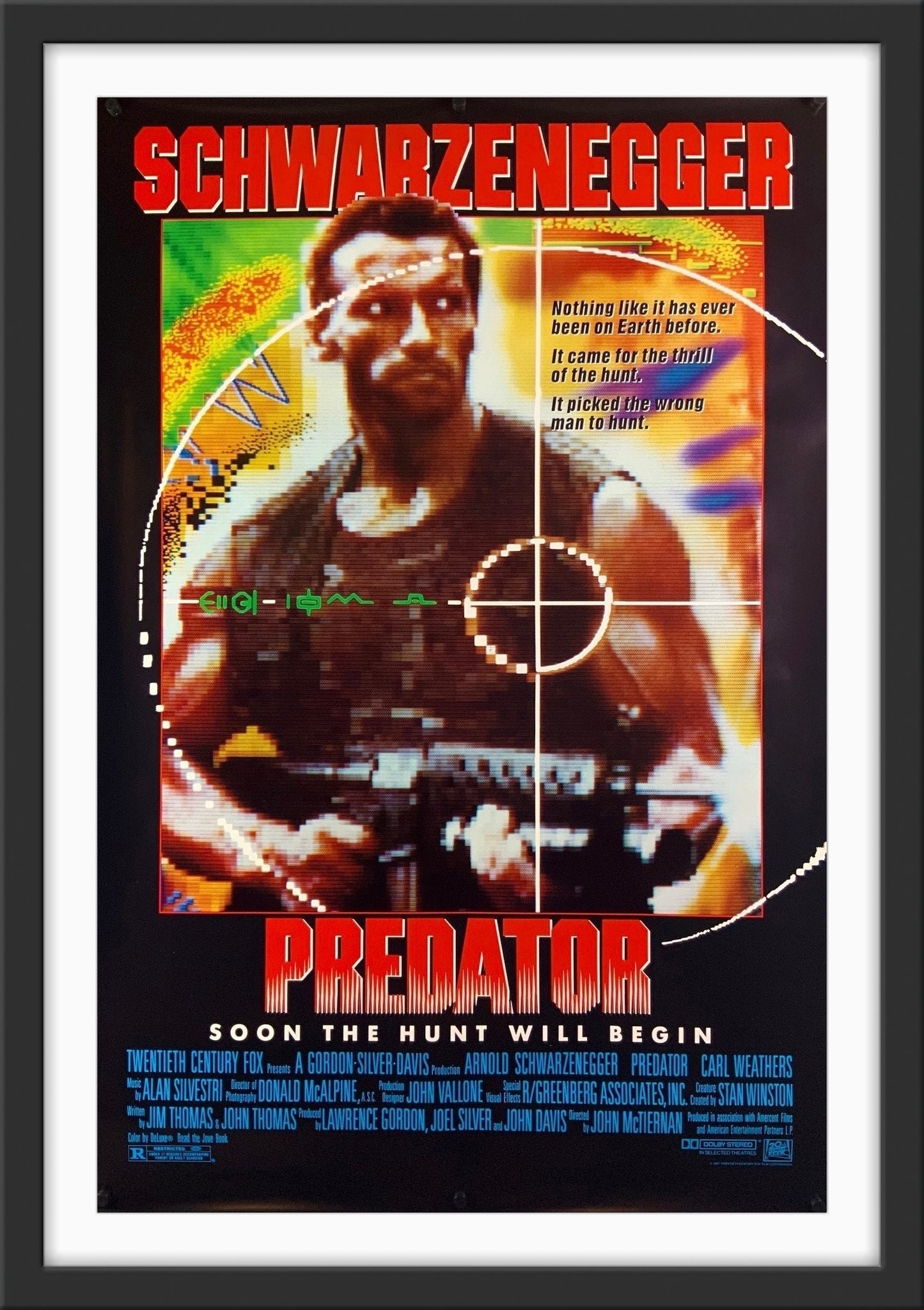 An original movie poster for the Arnold Schwarzenegger film Predator