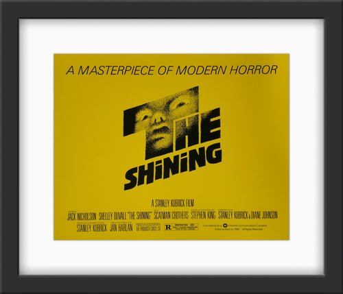 An original 8x10 title lobby card with art by Saul Bass for the Stanley Kubrick film The Shining
