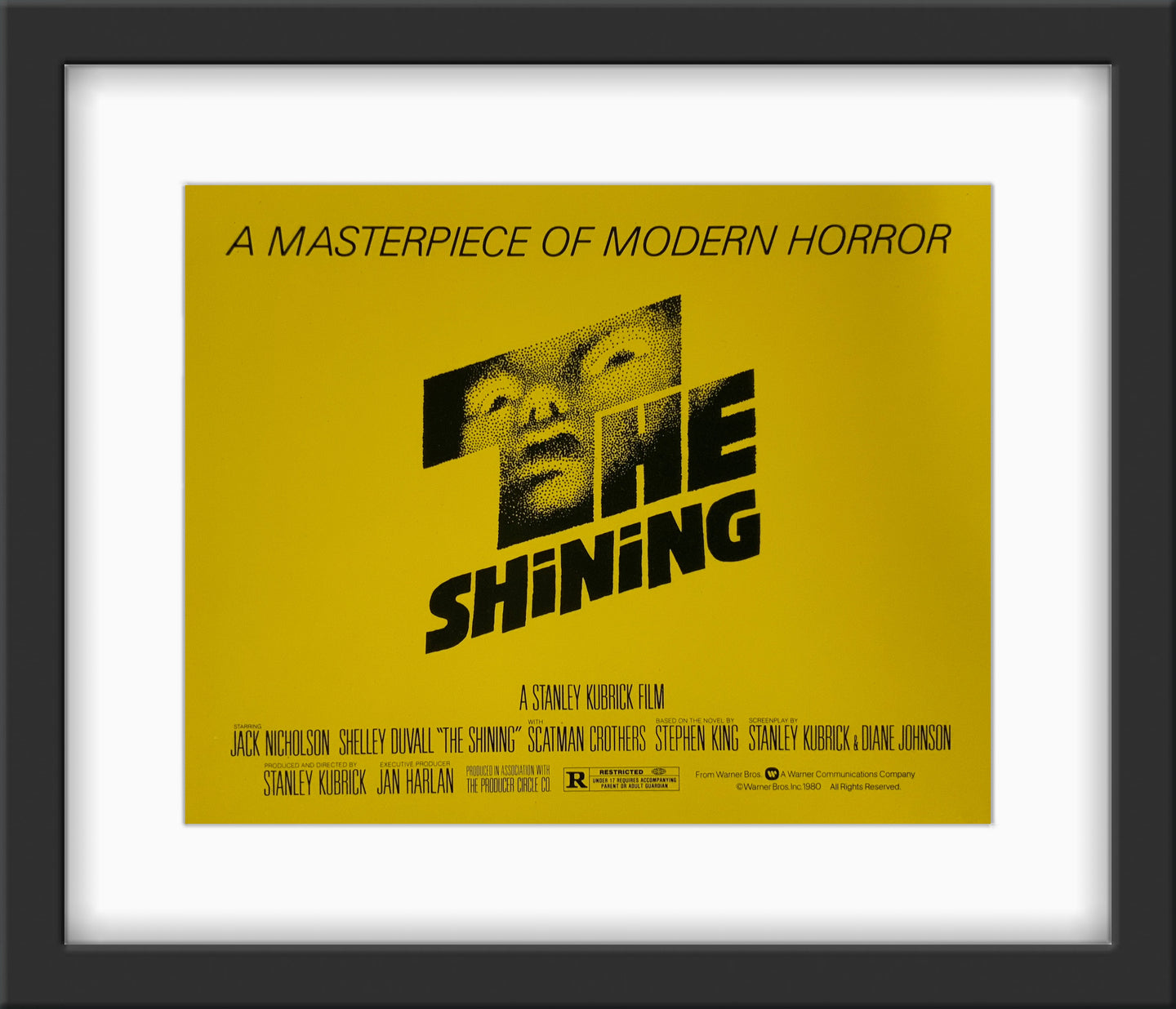 An original 8x10 title lobby card with art by Saul Bass for the Stanley Kubrick film The Shining