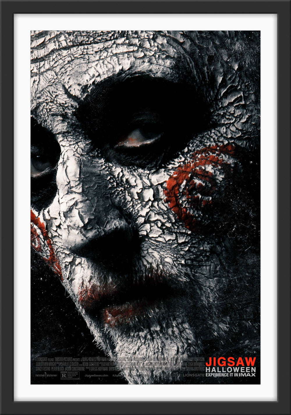 An original movie poster for the Saw film Jigsaw