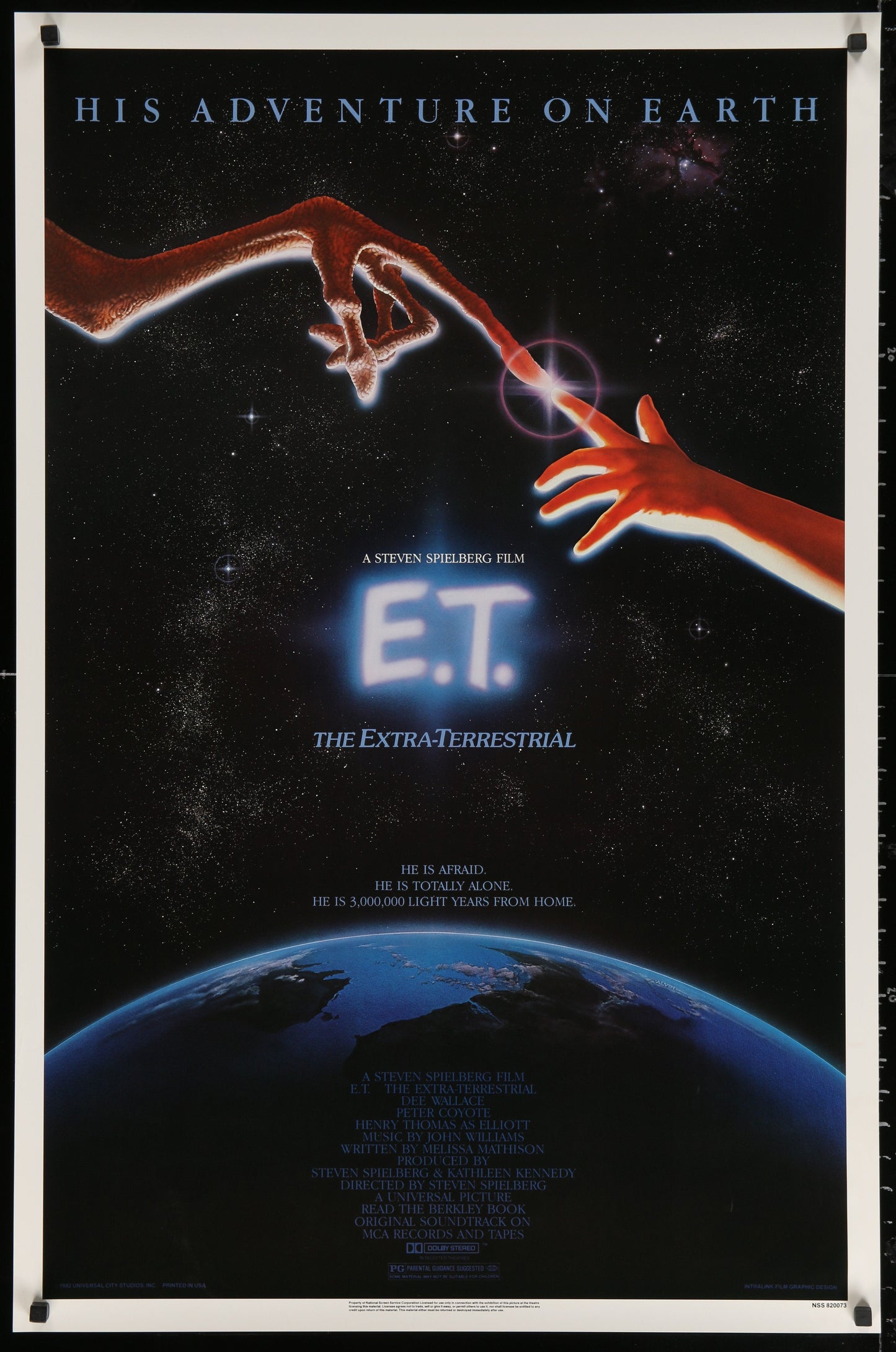 An original movie poster for the film E.T. The Extra Terrestrial