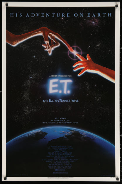 An original movie poster for the film E.T. The Extra Terrestrial