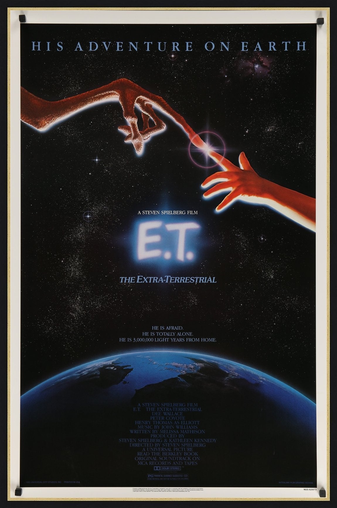 An original movie poster for the film E.T.