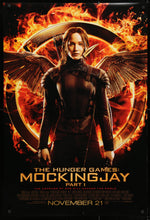 Load image into Gallery viewer, An original movie poster for the Hunger Games film Mockingjay Part 1