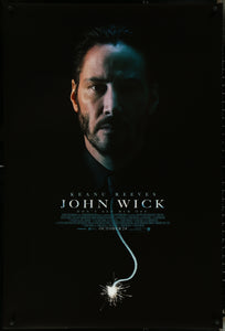 An original movie poster for the Keanu Reeves film John Wick