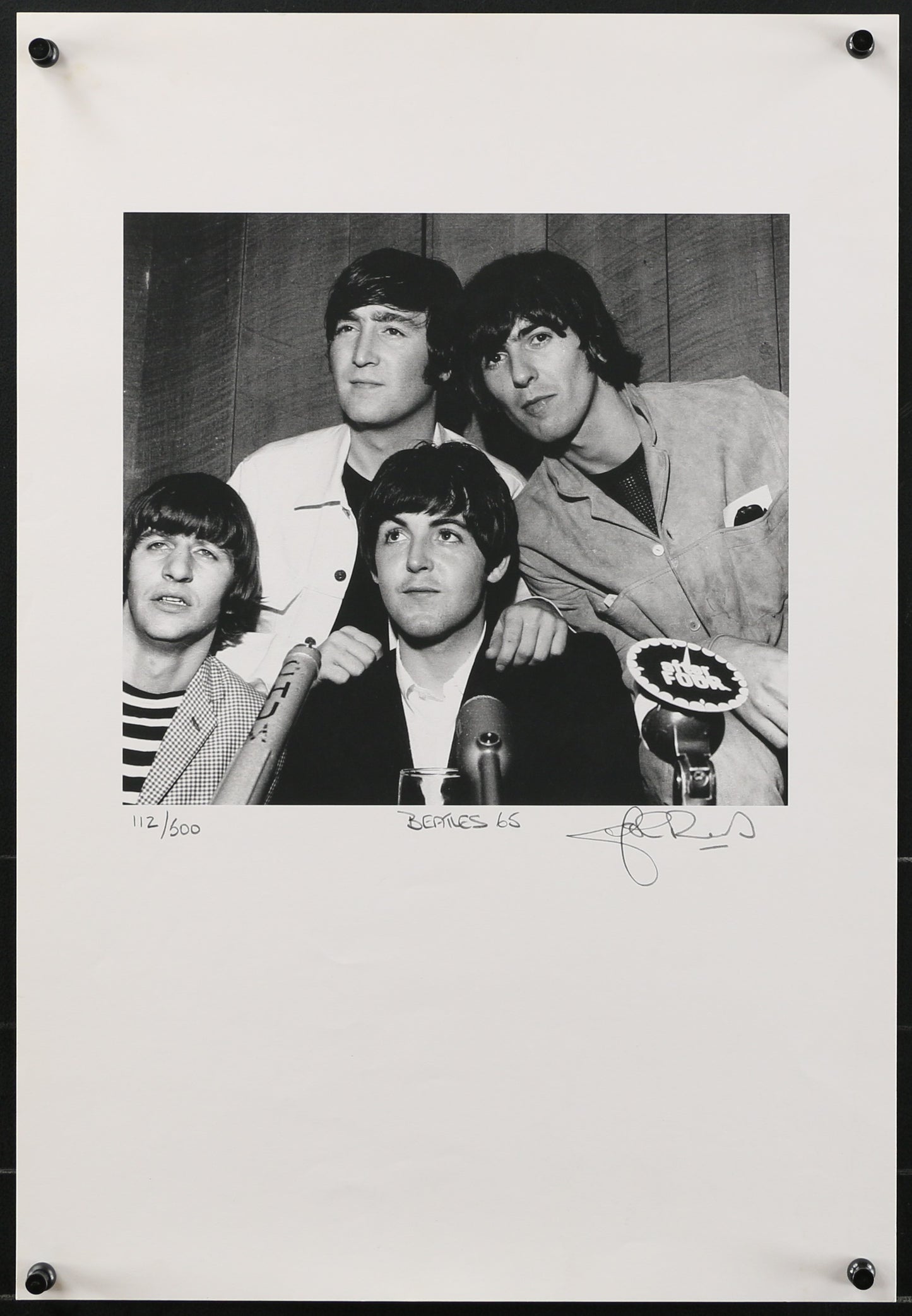 An art print byJohn Rowlands of The Beatles from Toronto 1965. Signed and numbered.