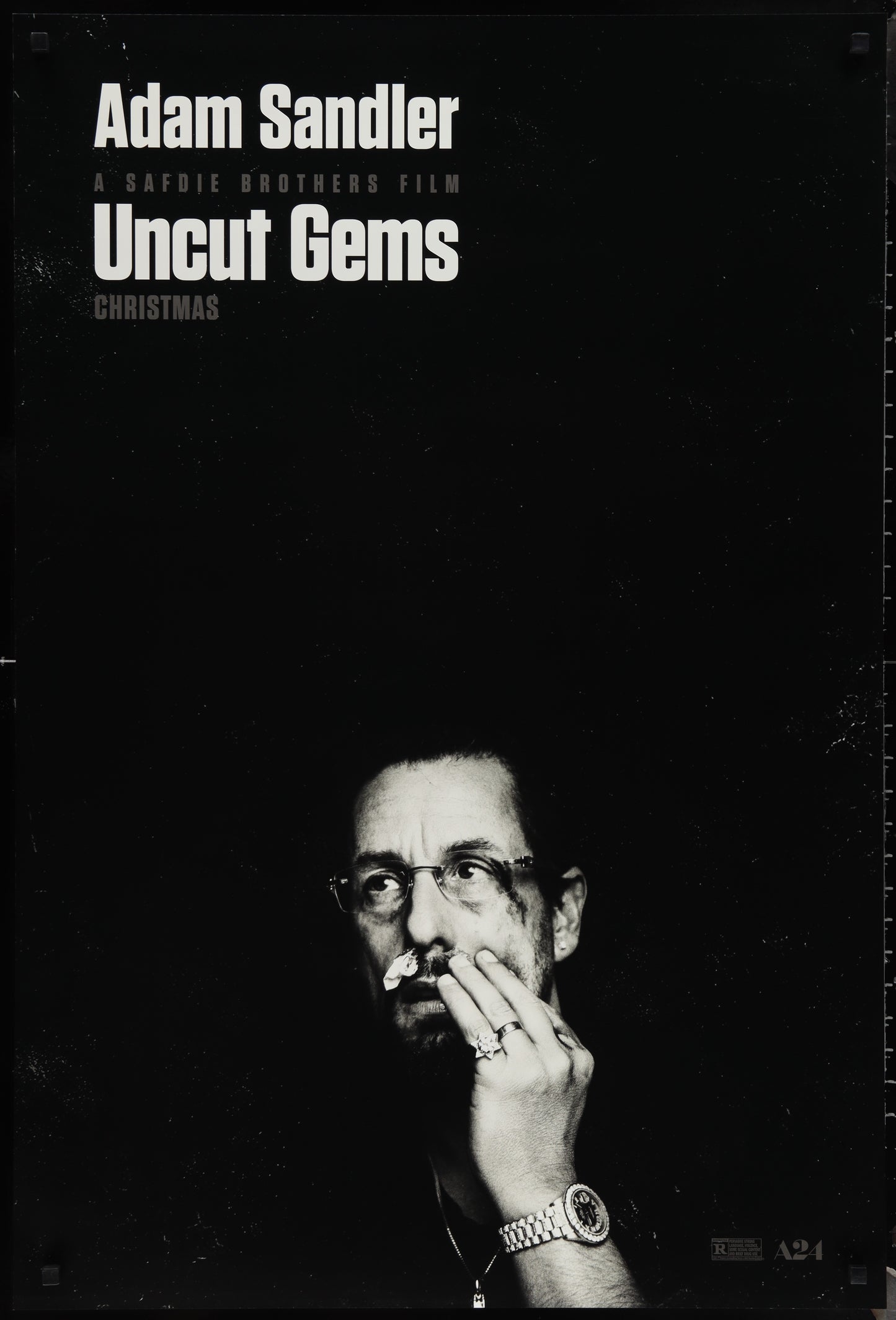 An original movie poster for the Adam Sandler film Uncut Gems