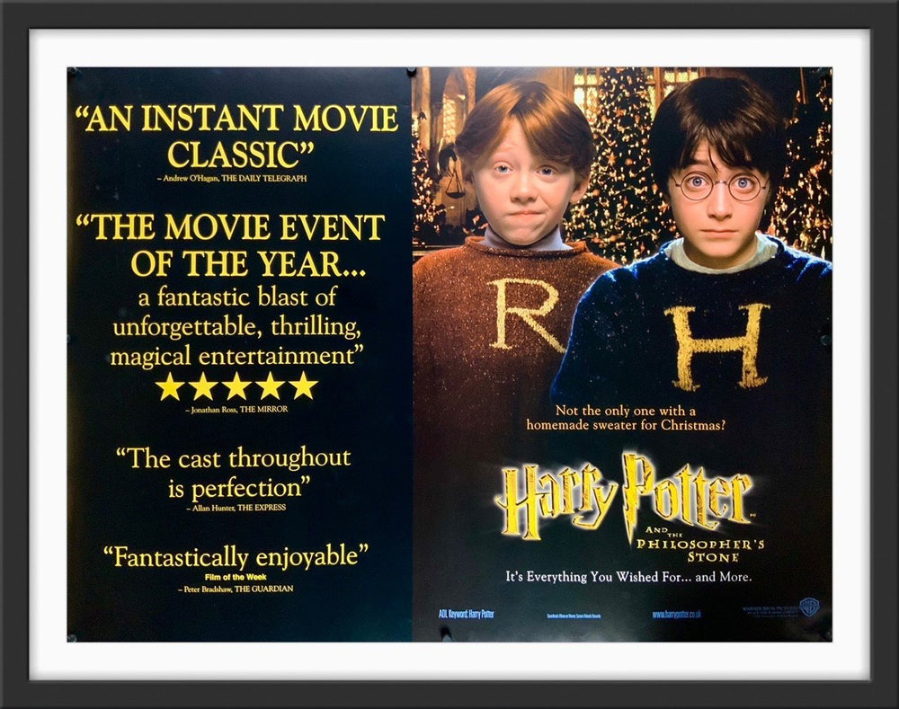 An original movie poster for the film Harry Potter and the Philosopher's Stone
