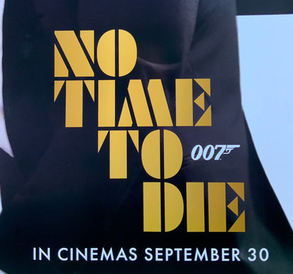 An original movie poster for the James Bond film No Time To Die