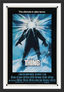 An original movie poster for the John Carpenter film The Thing with artwork by Drew Struzan