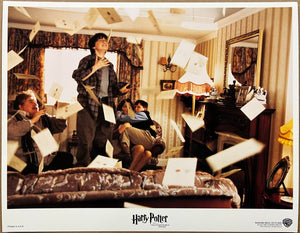 An original 11x14 lobby card from the Wizarding World film Harry Potter and the Philosopher's Stone (Sorcerer's)