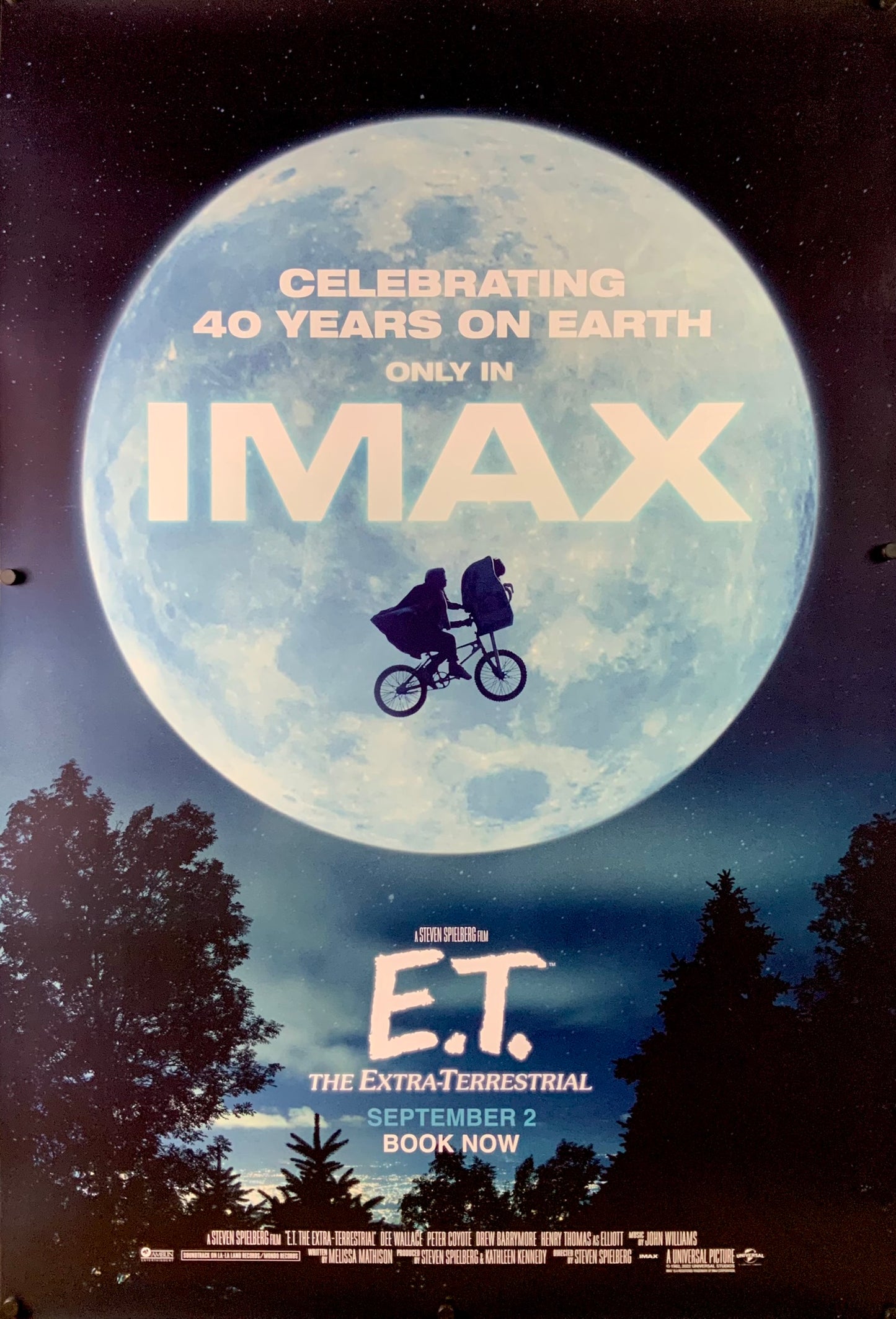 An original movie poster for the Steven Spielberg film E.T. The Extra Terrestrial