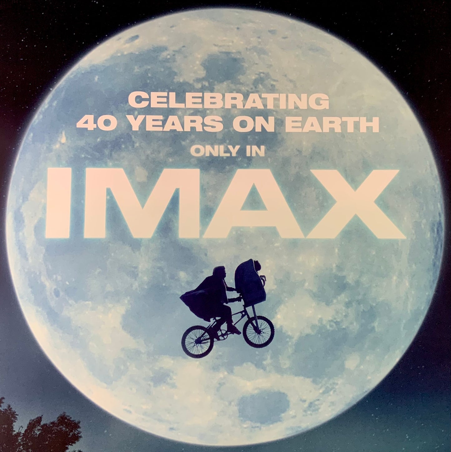 An original movie poster for the Steven Spielberg film E.T. The Extra Terrestrial