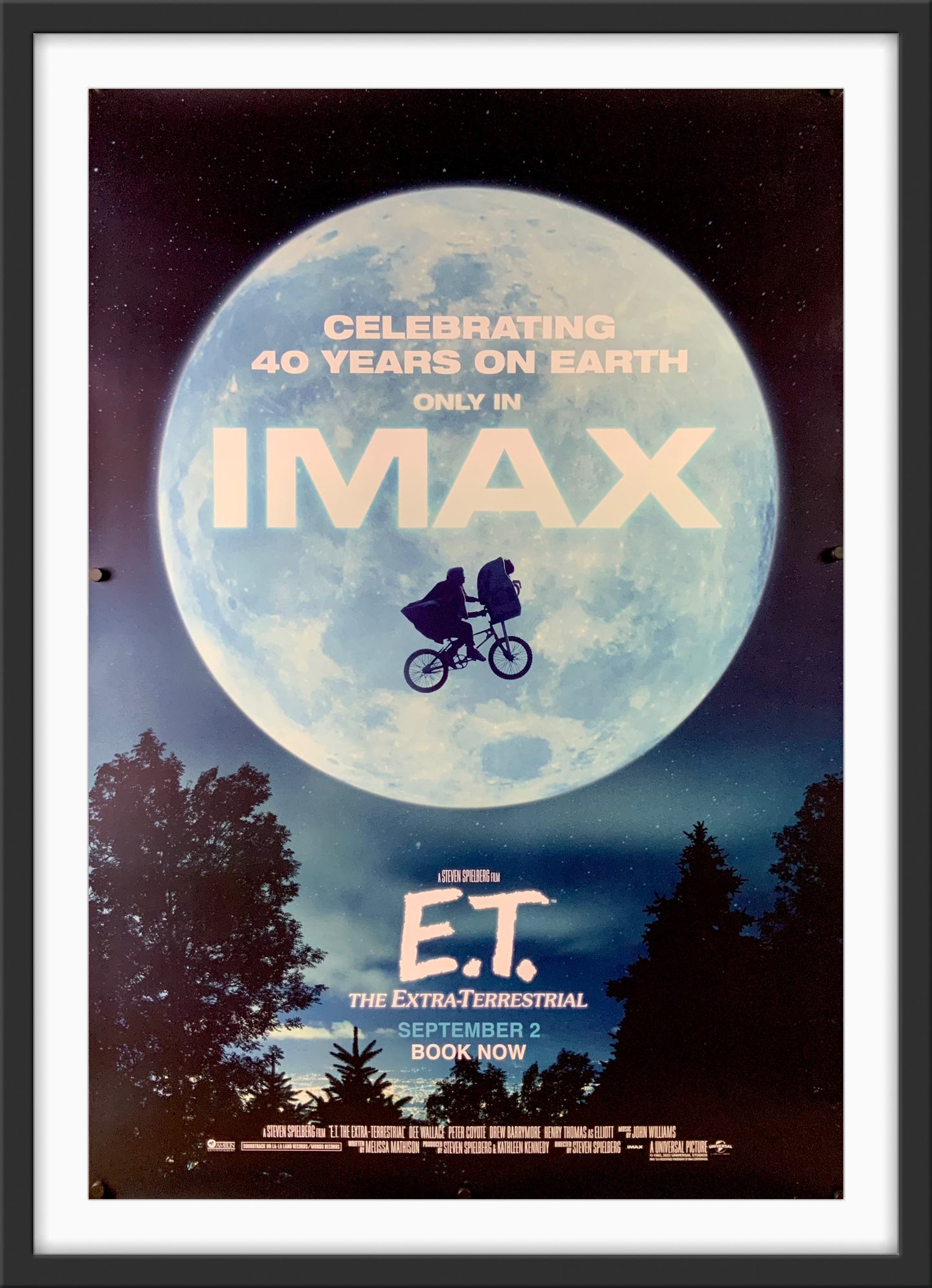 An original movie poster for the Steven Spielberg film E.T. The Extra Terrestrial