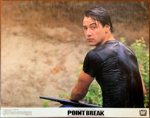 An original 11x14 lobby card for the film Point Break