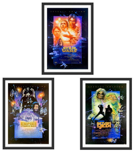 A trio of original Star Wars movie posters with artwork by Drew Struzan