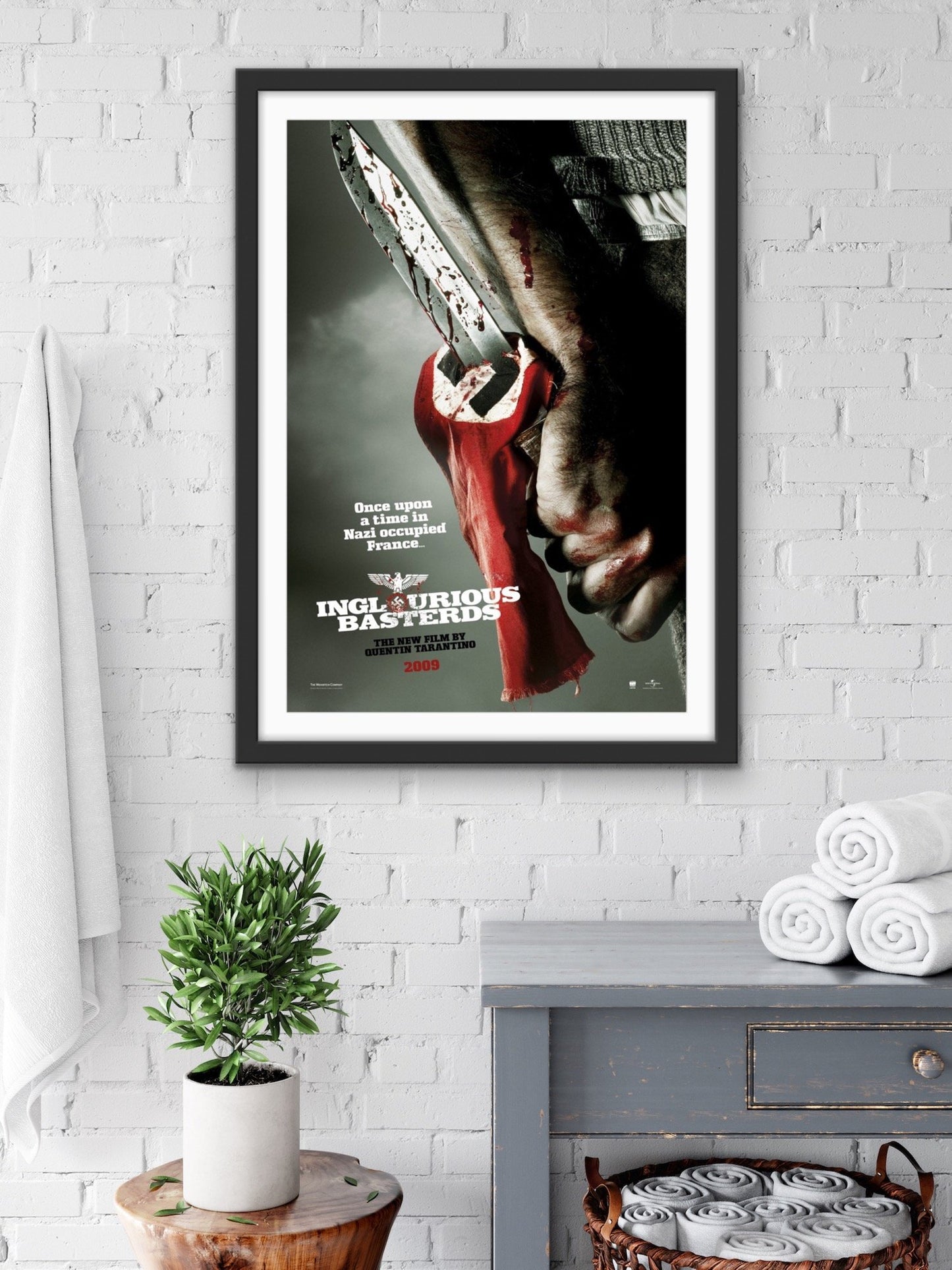 An original movie poster for the Tarantino film Inglourious Basterds