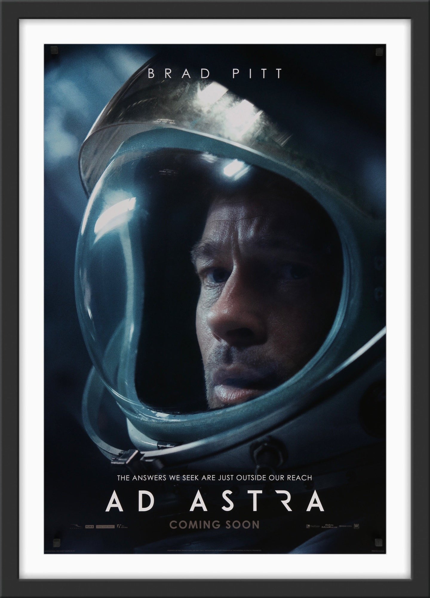 An original movie poster for the film Ad Astra with Brad Pitt