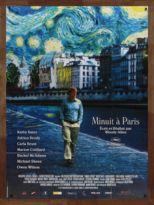 An original movie poster for the Woody Allen film Midnight In Paris