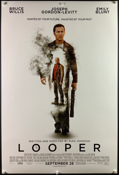 An original movie poster for the film Looper