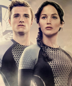 An original movie poster for the Hunger Games film Catching Fire