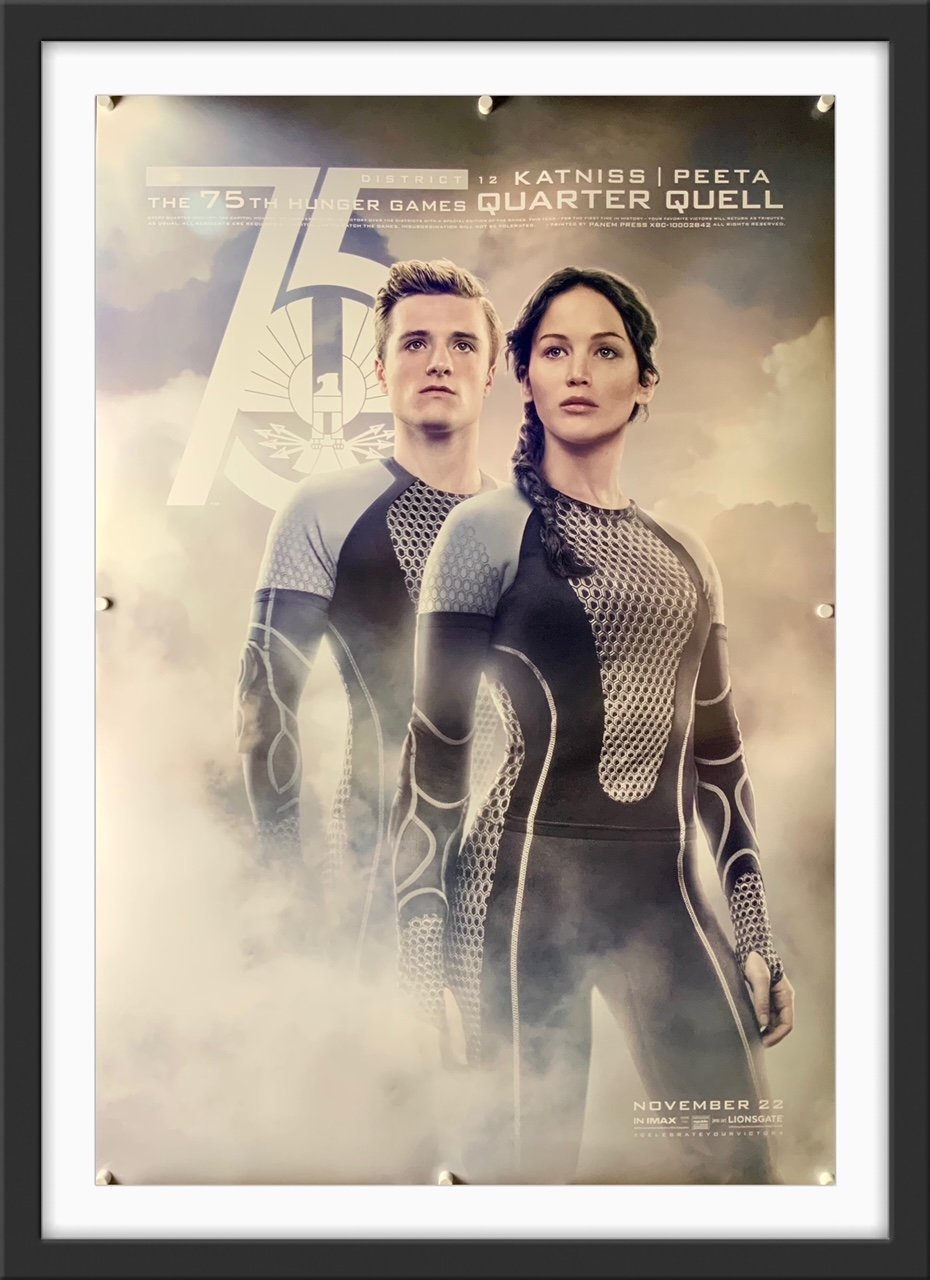 An original movie poster for the Hunger Games film Catching Fire