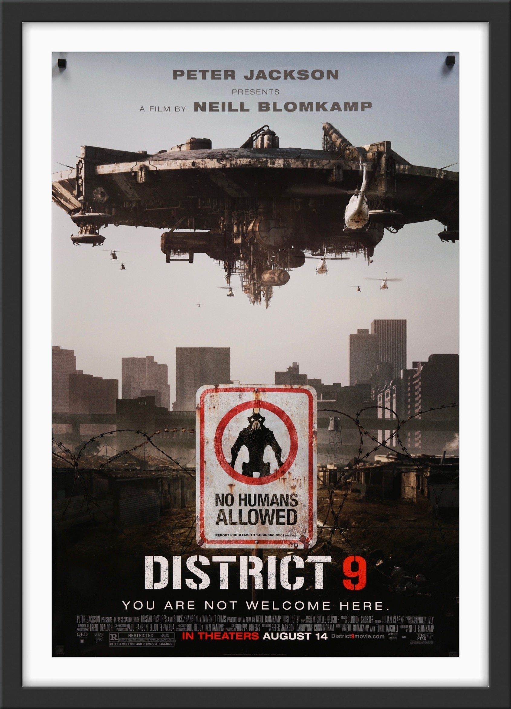 An original movie poster for the sci-fi film District 9