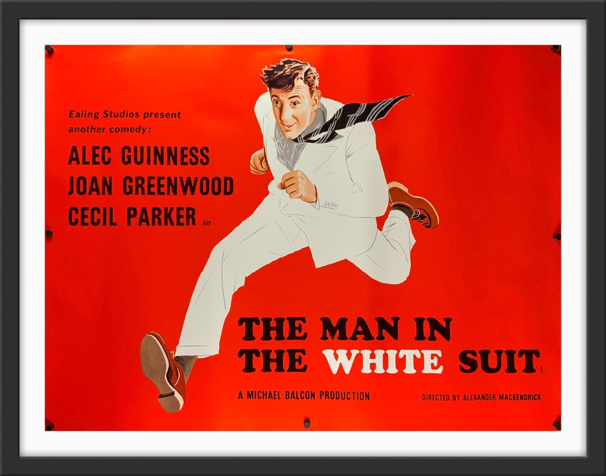 An original movie poster for the Ealing Studios comedy film The Man In The White Suit